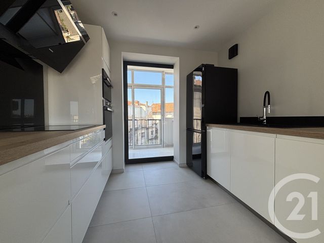 Afficher la photo en grand Appartement F3 à vendre - 3 pièces - 66.97 m2 - ALES - 30 - LANGUEDOC-ROUSSILLON - Century 21 Impact Immobilier