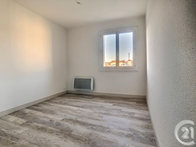 Afficher la photo en grand Appartement F3 à louer - 3 pièces - 65.9 m2 - ALES - 30 - LANGUEDOC-ROUSSILLON - Century 21 Impact Immobilier