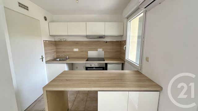 Appartement F2 bis à louer - 3 pièces - 52.0 m2 - ALES - 30 - LANGUEDOC-ROUSSILLON - Century 21 Impact Immobilier