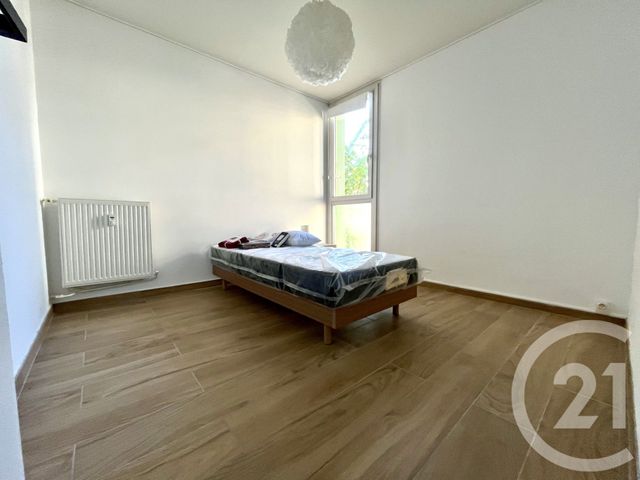 Afficher la photo en grand Appartement F3 à louer - 3 pièces - 60.0 m2 - ALES - 30 - LANGUEDOC-ROUSSILLON - Century 21 Impact Immobilier