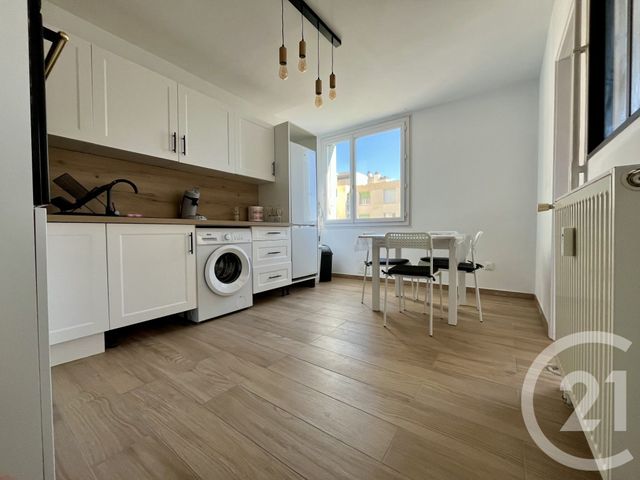 Afficher la photo en grand Appartement F3 à louer - 3 pièces - 60.0 m2 - ALES - 30 - LANGUEDOC-ROUSSILLON - Century 21 Impact Immobilier