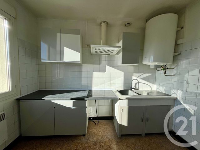 Appartement F4 à louer - 4 pièces - 65.0 m2 - ALES - 30 - LANGUEDOC-ROUSSILLON - Century 21 Impact Immobilier