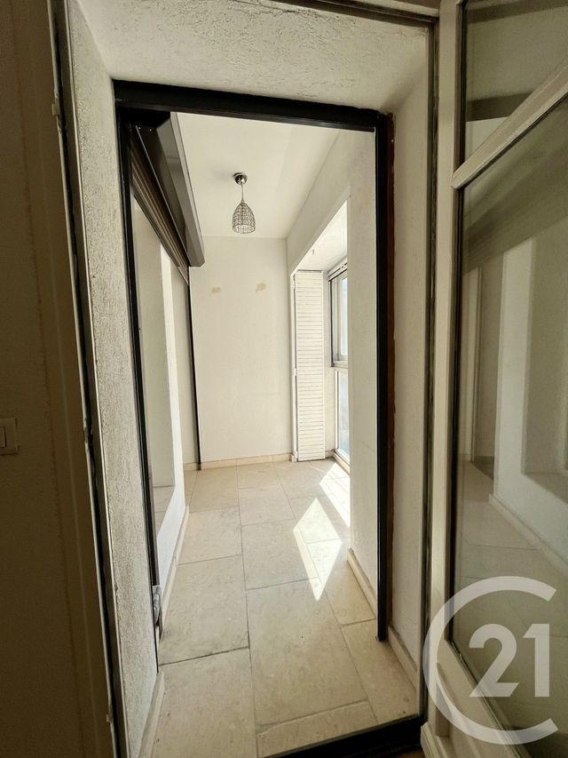 Appartement F3 à louer - 3 pièces - 77.07 m2 - LEZAN - 30 - LANGUEDOC-ROUSSILLON - Century 21 Impact Immobilier