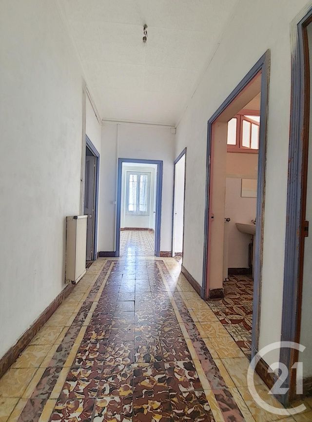 Afficher la photo en grand Appartement F3 à vendre - 3 pièces - 75.85 m2 - ALES - 30 - LANGUEDOC-ROUSSILLON - Century 21 Impact Immobilier