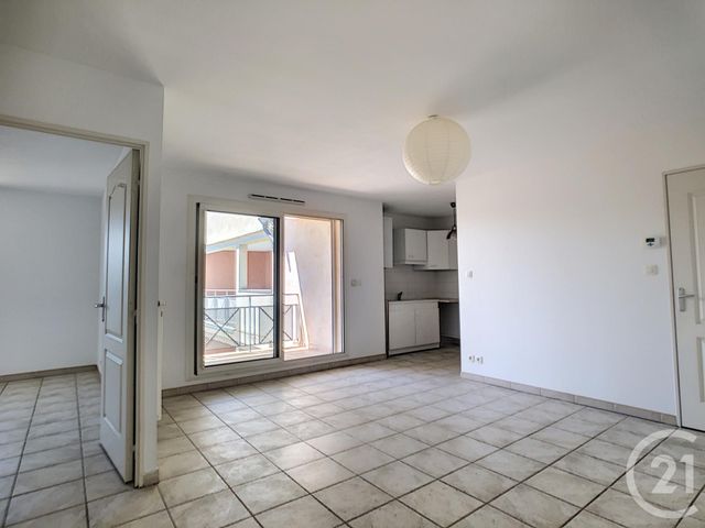 Afficher la photo en grand appartement à louer - 2 pièces - 40.25 m2 - ALES - 30 - LANGUEDOC-ROUSSILLON - Century 21 Impact Immobilier